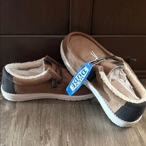 NWT Hey Dude Tan and Black Cozy Slip-Ons. Fur lined. Men’s SZ 11